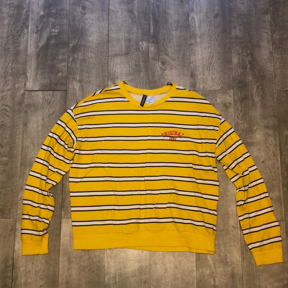 Long sleeve yellow shirt size M.